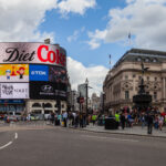 blockdag-shines-at-piccadilly-circus,-forecasting-$10-by-2025-amid-dogecoin-surge-and-shiba-inu-price-prediction